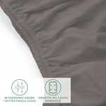 Prześcieradło jersey z elastanem w kolorze antracytowym, leżące na białym tle. Widoczna jest gumka obwodowa oraz tekstura materiału.