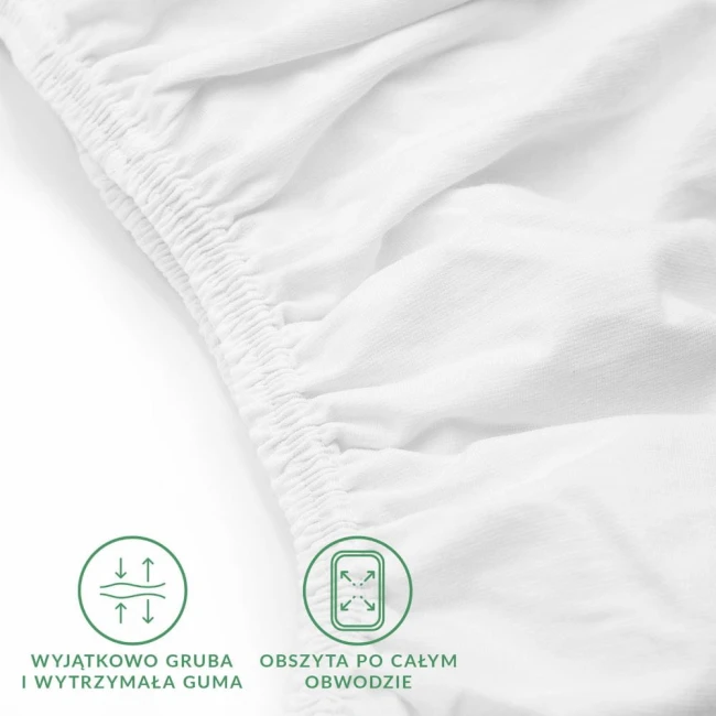 Prześcieradło jersey z elastanem w kolorze białym, z widoczną gumką, przedstawione w zbliżeniu. Materiał jest gładki i elastyczny, a gumka obwodowa jest mocno wszyta, co zapewnia stabilne dopasowanie. Tło proste i jasne.