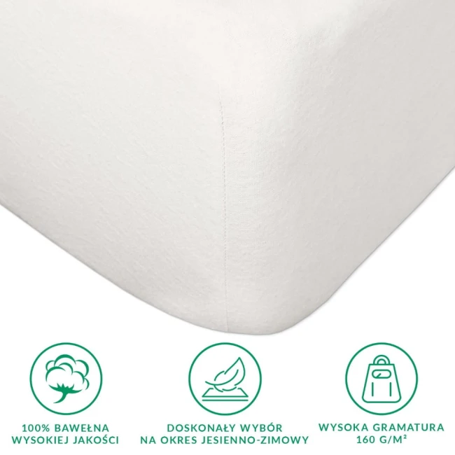 Prześcieradło flanelowe z gumką w kolorze kremowym, rozmiar 200x220 cm, wykonane z bawełny o gramaturze 160 g/m². Widoczny detal gumki na brzegach oraz tekstura flaneli. Położone na białym tle, ukazujące gładką powierzchnię.
