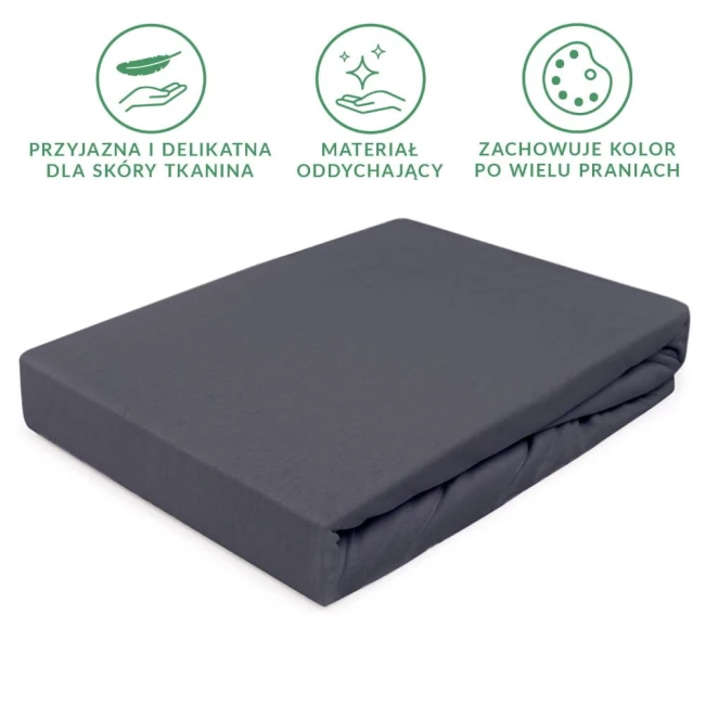 Prześcieradło jersey z gumką w kolorze antracytowym, rozmiar 160x200 cm, leżące na białym tle, z delikatną, teksturowaną powierzchnią. Widoczna gumka utrzymująca prześcieradło na materacu. Produkt oddychający, przyjazny dla skóry, łatwy w pielęgnacji.