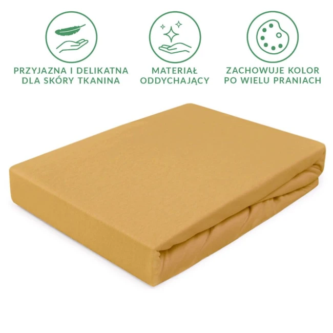 Prześcieradło jersey z gumką w kolorze musztardowym, rozmiar 160x200 cm, leżące na białym tle. Materiał delikatny i oddychający, z widoczną gumką do mocowania. Ujęcie frontalne, podkreślające gładką fakturę tkaniny.