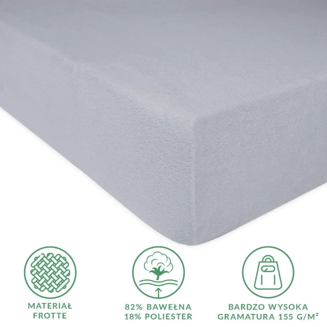 Prześcieradło frotte z gumką 180x200 w kolorze popielatym, wykonane z 82% bawełny i 18% poliestru. W tle widoczna jednolita powierzchnia, produkt leży na płasko, ukazując gładką fakturę materiału.