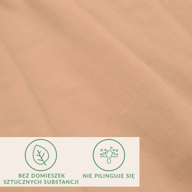 Prześcieradło jersey z elastanem 140x200 w kolorze różowym, leżące na płaskiej powierzchni. W tle widoczne ikony informacyjne: bez domieszek sztucznych substancji, nie pilinguje się. Materiał gładki, elastyczny, idealny do sypialni.