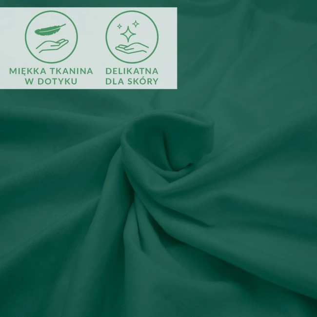 Prześcieradło jersey z elastanem 140x200 w kolorze zielonym, miękkie w dotyku, wykazuje się delikatnością dla skóry. Ujęcie z bliska, ukazujące fakturę materiału oraz symbole dotyczące komfortu użytkowania.