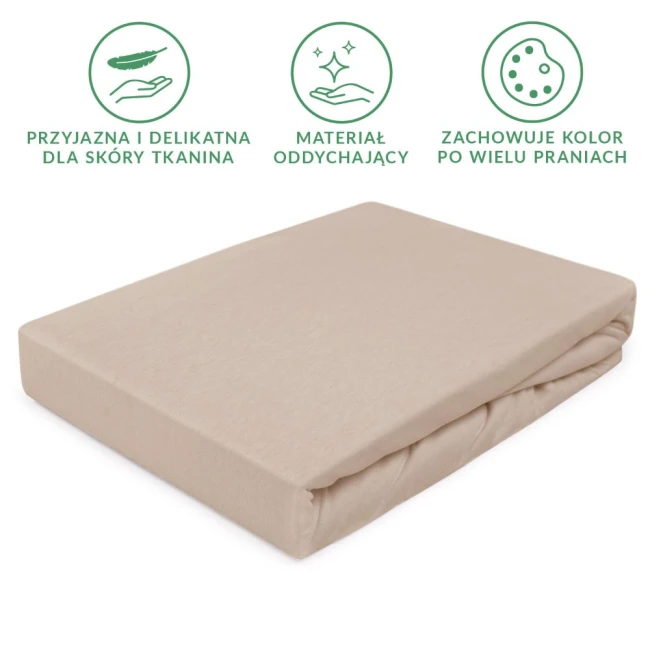 Prześcieradło jersey z gumką w kolorze beżowym, rozmiar 60x120 cm, leżące płasko. Materiał jest gładki i elastyczny, z widoczną gumką na brzegu. Tło białe, co podkreśla kolor i fakturę materiału.